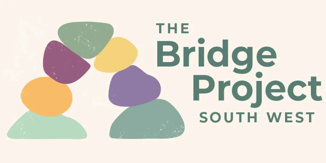 a logo made up of a bridge made of pebbles